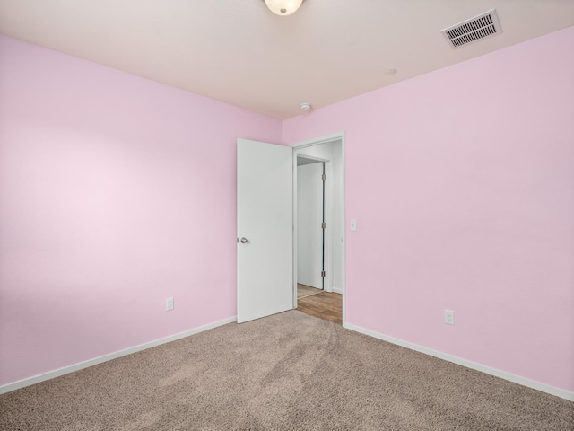 703 Tulip Cir, Dinuba, CA 93618 - unfurnished room with carpet, baseboards, and a smoke detector