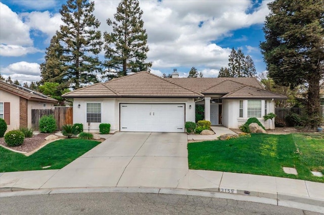 3159 Cedar Creek Ln, Madera, CA 93637 - single story home with a tiled roof, stucco siding, an attached garage, and a chimney