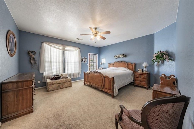 3159 Cedar Creek Ln, Madera, CA 93637 - carpeted bedroom with a ceiling fan, baseboards, and a textured ceiling