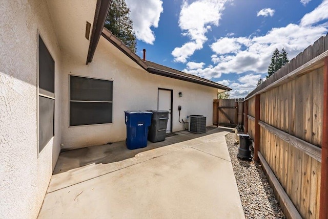 3159 Cedar Creek Ln, Madera, CA 93637 - view of patio / terrace with central AC and a gate