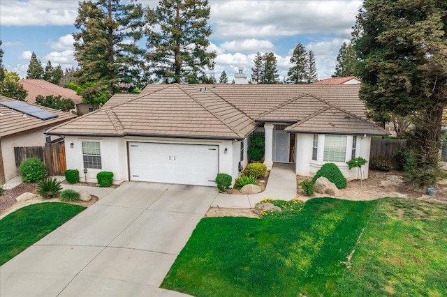 3159 Cedar Creek Ln, Madera, CA 93637 - ranch-style house with an attached garage, a tile roof, stucco siding, a chimney, and driveway