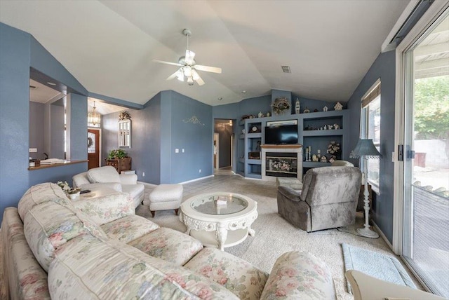 3159 Cedar Creek Ln, Madera, CA 93637 - living room with vaulted ceiling, ceiling fan, baseboards, and carpet flooring