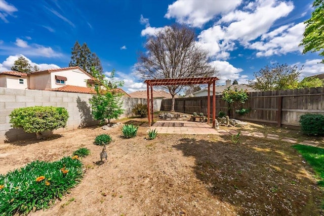 3159 Cedar Creek Ln, Madera, CA 93637 - fenced backyard featuring a pergola and a patio