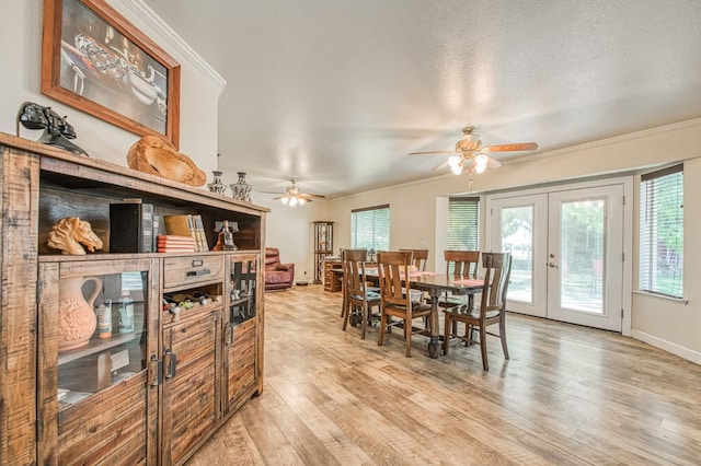 1183 E Dinuba Ave, Fresno, CA 93725 - dining room with french doors, a ceiling fan, healthy amount of natural light, and crown molding