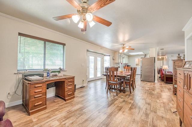 1183 E Dinuba Ave, Fresno, CA 93725 - dining room featuring ceiling fan, french doors, crown molding, light wood-style flooring, and baseboards