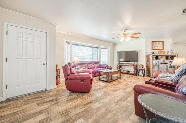 1183 E Dinuba Ave, Fresno, CA 93725 - living room with crown molding, ceiling fan, and light wood-style flooring