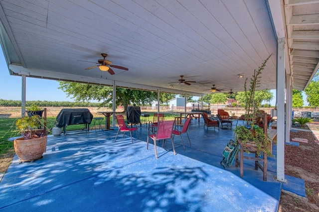 1183 E Dinuba Ave, Fresno, CA 93725 - view of patio with a ceiling fan, outdoor dining space, and grilling area