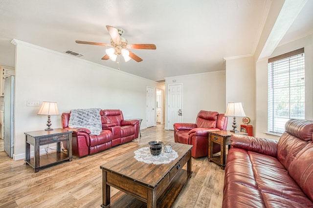 1183 E Dinuba Ave, Fresno, CA 93725 - living area featuring a ceiling fan, light wood-style floors, ornamental molding, and baseboards