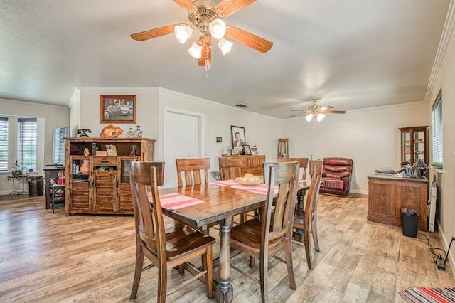 1183 E Dinuba Ave, Fresno, CA 93725 - dining area with a ceiling fan, light wood-type flooring, crown molding, and baseboards