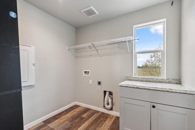 2830 Leanna Ave, Fresno, CA 93737 - laundry room featuring hookup for an electric dryer, dark wood-style floors, hookup for a washing machine, and baseboards