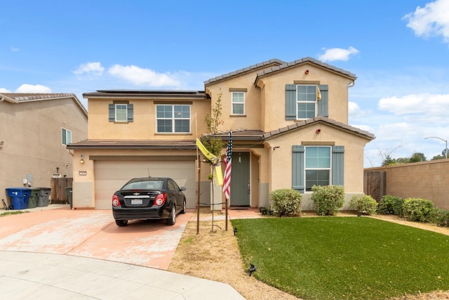2830 Leanna Ave, Fresno, CA 93737 - view of front of property with concrete driveway, an attached garage, solar panels, stucco siding, and a tiled roof