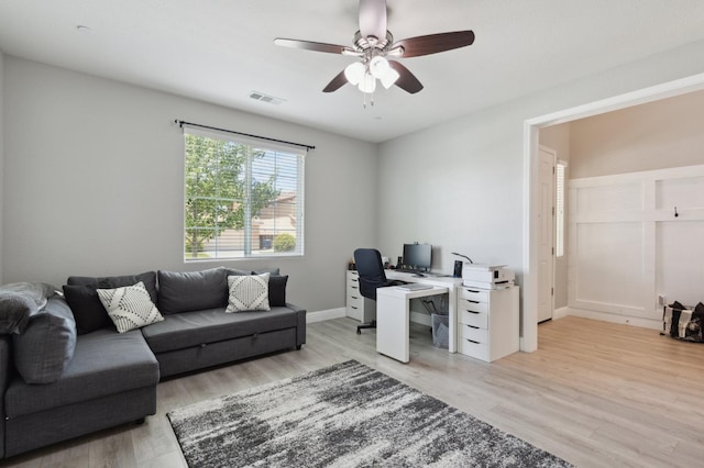 1697 Whiteash Ave, Clovis, CA 93619 - office area featuring a ceiling fan, light wood-style flooring, and baseboards