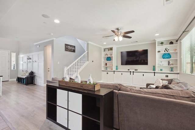 1697 Whiteash Ave, Clovis, CA 93619 - living room with ceiling fan, light wood-style floors, stairway, recessed lighting, and built in features