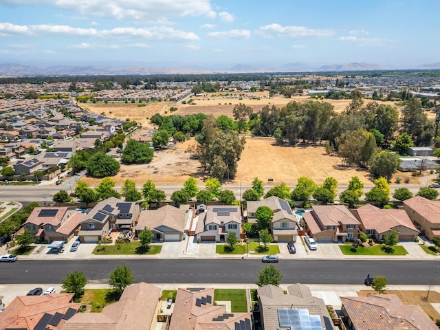 1697 Whiteash Ave, Clovis, CA 93619 - aerial perspective of suburban area with a mountainous background