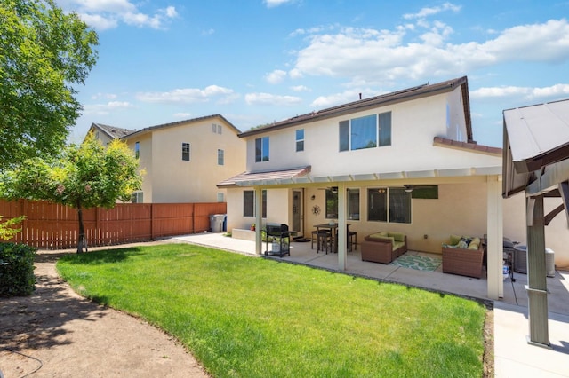 1697 Whiteash Ave, Clovis, CA 93619 - rear view of property featuring stucco siding, outdoor lounge area, and a patio area