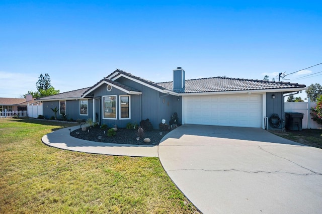 18118 Rd 26, Madera, CA 93638 - ranch-style home featuring a tile roof, a chimney, a garage, and driveway