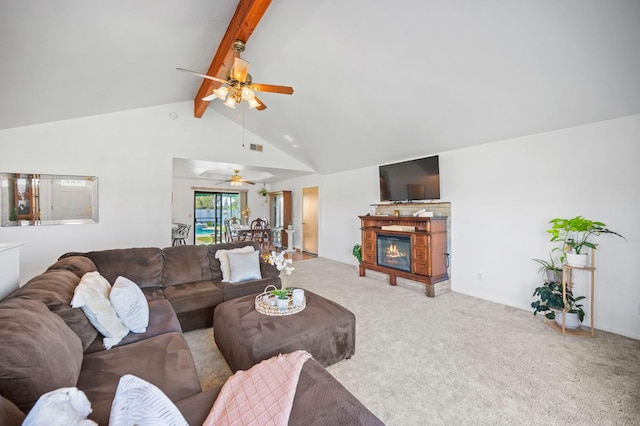 18118 Rd 26, Madera, CA 93638 - carpeted living area featuring beamed ceiling, a ceiling fan, a glass covered fireplace, and high vaulted ceiling