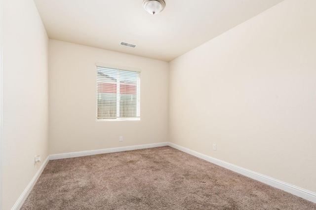 2718 Fern Ct, Selma, CA 93662 - empty room featuring carpet and baseboards