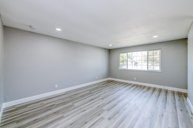 153 Birch, Fresno, CA 93650 - spare room with baseboards, recessed lighting, light wood-style flooring, and a smoke detector