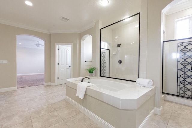 2138 El Paso Ave, Clovis, CA 93611 - bathroom with ornamental molding, a bath, a stall shower, tile patterned flooring, and ceiling fan