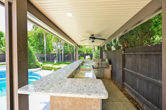 2138 El Paso Ave, Clovis, CA 93611 - fenced backyard featuring a ceiling fan and a patio area