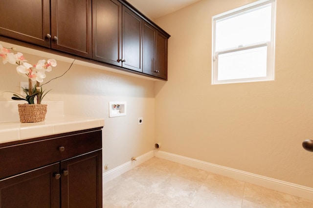 2138 El Paso Ave, Clovis, CA 93611 - laundry area featuring hookup for a washing machine, cabinet space, hookup for an electric dryer, baseboards, and hookup for a gas dryer
