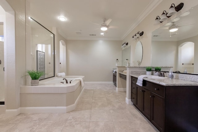 2138 El Paso Ave, Clovis, CA 93611 - bathroom featuring ceiling fan, a bath, two vanities, a tile shower, and crown molding