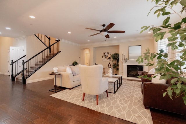 2138 El Paso Ave, Clovis, CA 93611 - living room with hardwood / wood-style floors, stairway, baseboards, a glass covered fireplace, and ceiling fan