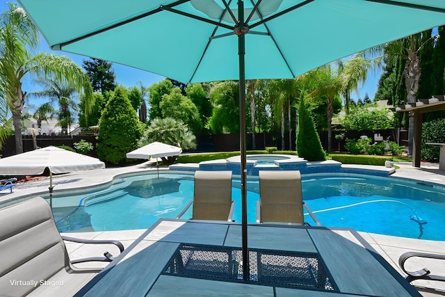 2138 El Paso Ave, Clovis, CA 93611 - view of swimming pool featuring a fenced backyard, a pool with connected hot tub, and a patio
