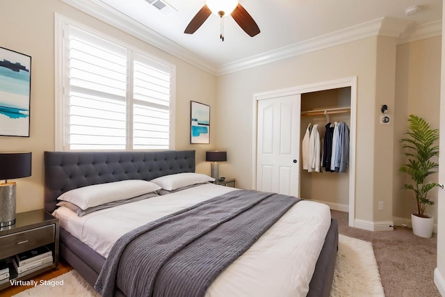 2138 El Paso Ave, Clovis, CA 93611 - bedroom featuring a closet, ornamental molding, light carpet, baseboards, and ceiling fan