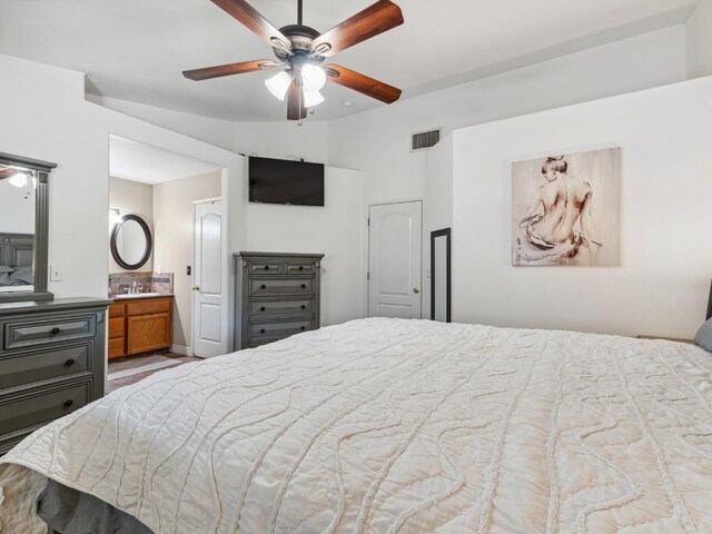 279 Lily Ave, Sanger, CA 93657 - bedroom featuring a sink, ensuite bathroom, and ceiling fan