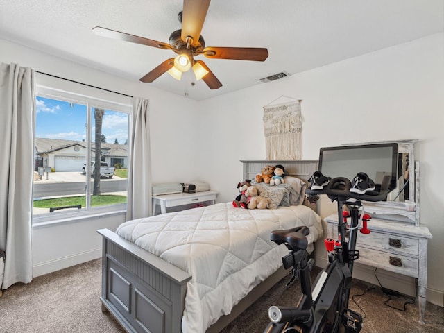 279 Lily Ave, Sanger, CA 93657 - bedroom with carpet floors, baseboards, and ceiling fan