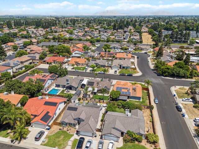 279 Lily Ave, Sanger, CA 93657 - aerial view of residential area with a mountainous background