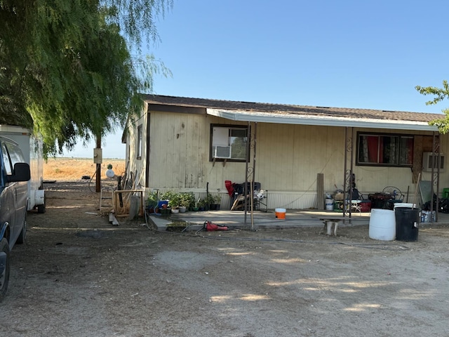 12326 E Dinuba Ave, Selma, CA 96662 - back of house featuring cooling unit