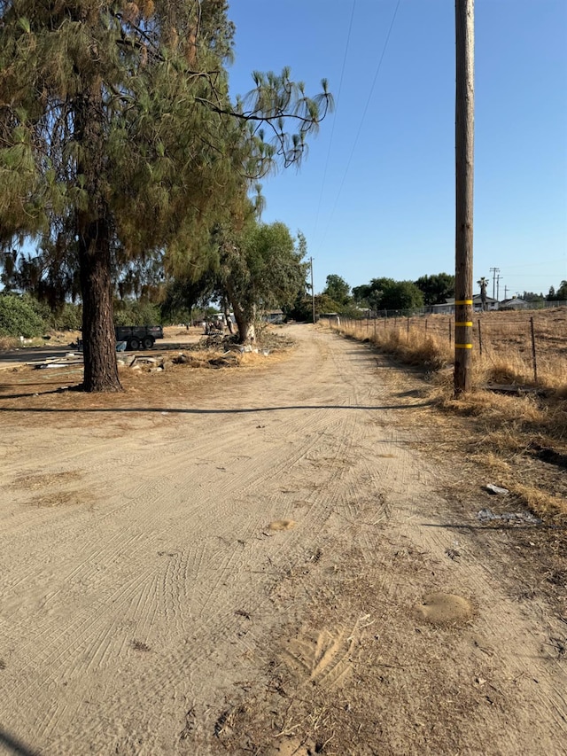 12326 E Dinuba Ave, Selma, CA 96662 - view of dirt / gravel road with a rural view