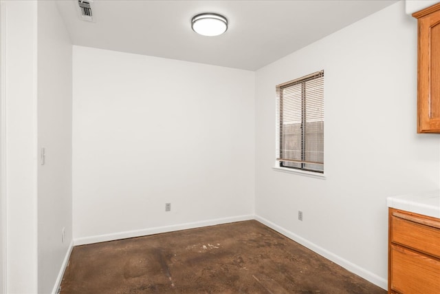 473 E Alluvial Ave Unit 107, Fresno, CA 93720 - unfurnished room featuring unfinished concrete floors and baseboards