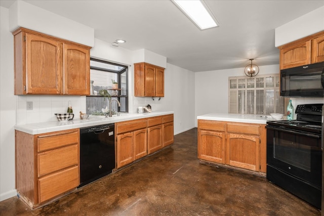 473 E Alluvial Ave Unit 107, Fresno, CA 93720 - kitchen featuring black appliances, tasteful backsplash, finished concrete flooring, a sink, and baseboards