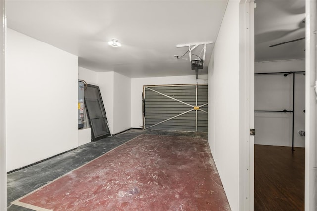 473 E Alluvial Ave Unit 107, Fresno, CA 93720 - garage featuring a garage door opener and gas water heater