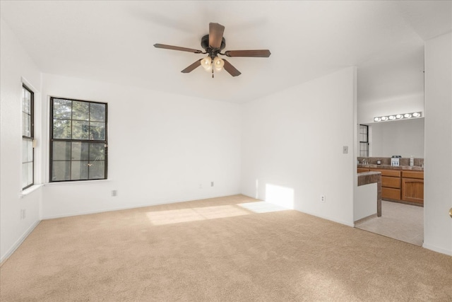 473 E Alluvial Ave Unit 107, Fresno, CA 93720 - unfurnished room featuring light colored carpet and ceiling fan