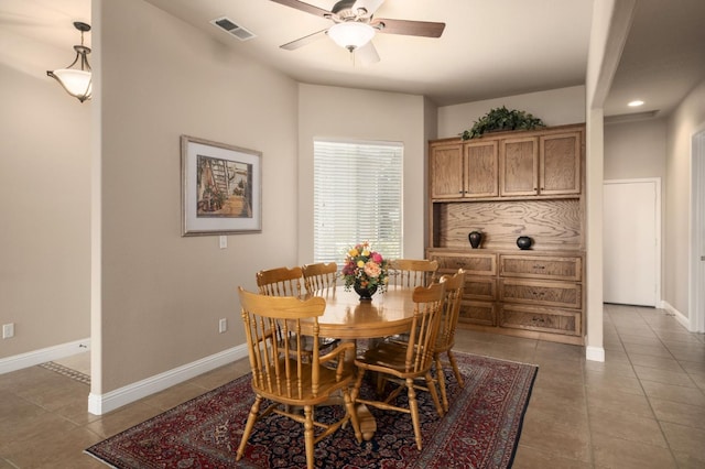 1752 Magnolia, Clovis, CA 93619 - tiled dining area with ceiling fan and baseboards
