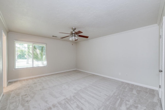 8259 N College Ave, Fresno, CA 93711 - empty room featuring ornamental molding, ceiling fan, light colored carpet, and baseboards