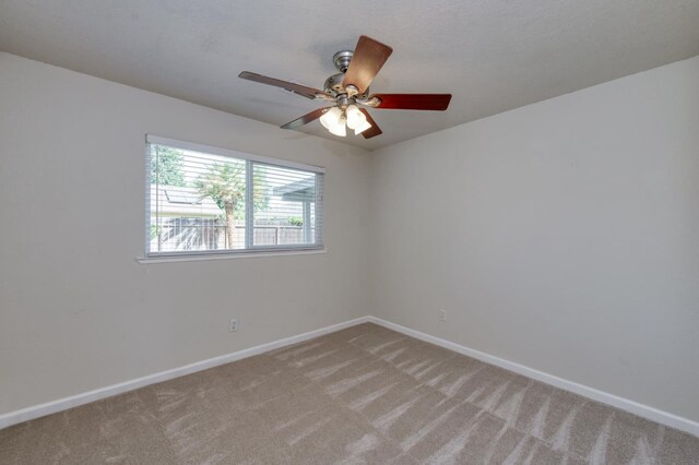 8259 N College Ave, Fresno, CA 93711 - spare room featuring baseboards, light colored carpet, and ceiling fan