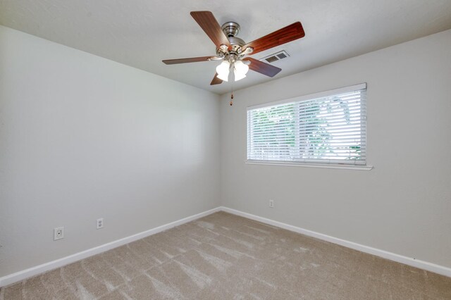 8259 N College Ave, Fresno, CA 93711 - empty room with baseboards, carpet flooring, and a ceiling fan