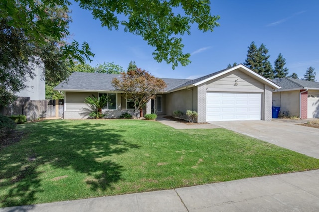 8259 N College Ave, Fresno, CA 93711 - single story home featuring an attached garage, driveway, and brick siding