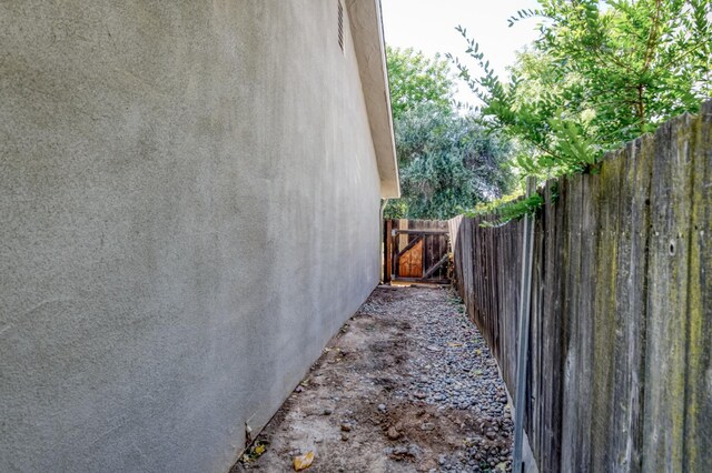 8259 N College Ave, Fresno, CA 93711 - view of side of property featuring stucco siding