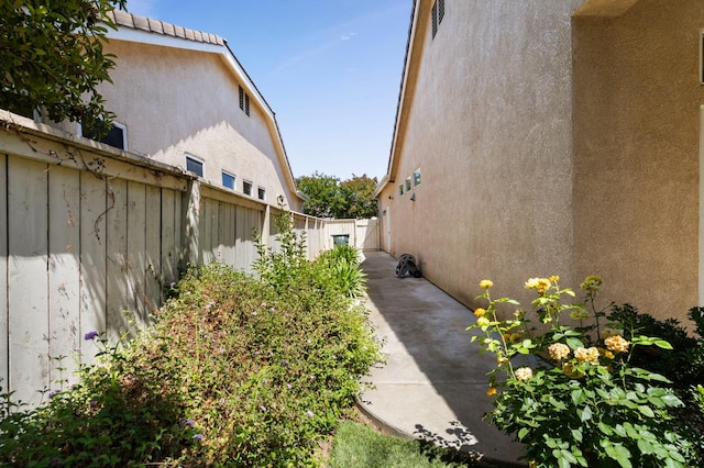 5125 N Via Amore, Fresno, CA 93711 - view of property exterior with stucco siding