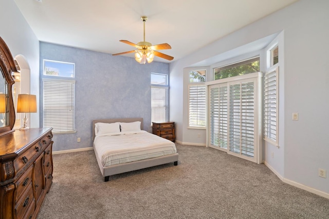 5125 N Via Amore, Fresno, CA 93711 - carpeted bedroom with access to exterior, baseboards, and ceiling fan
