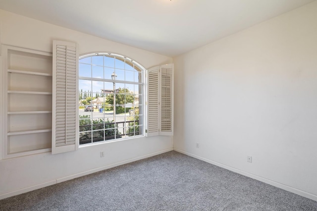 5125 N Via Amore, Fresno, CA 93711 - carpeted empty room with healthy amount of natural light and baseboards