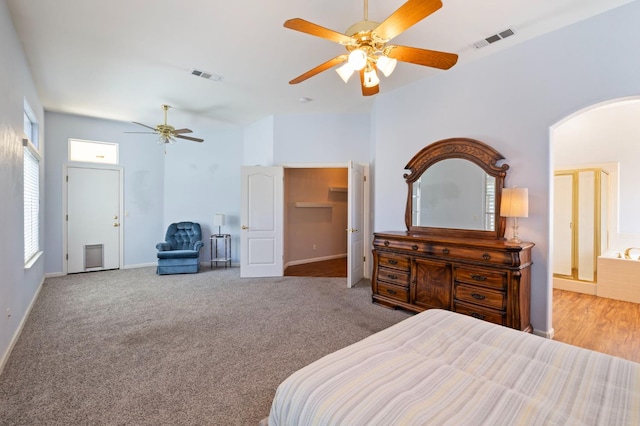 5125 N Via Amore, Fresno, CA 93711 - bedroom with arched walkways, baseboards, and a ceiling fan