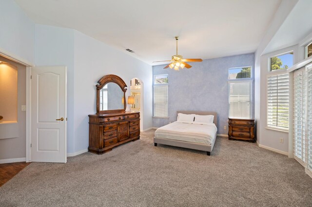 5125 N Via Amore, Fresno, CA 93711 - bedroom featuring carpet floors, multiple windows, and arched walkways